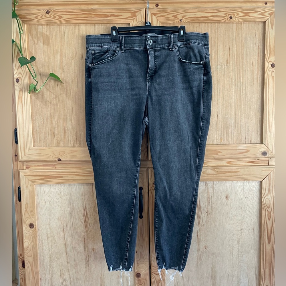 Torrid Bombshell skinny super soft black distressed frayed bottom jeans 22R